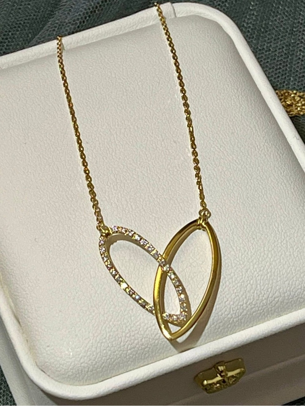 Interlocking Heart Pendant Necklace in Gold with natural diamonds